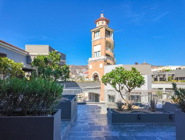 Corner unit with completely Private Rooftop. 